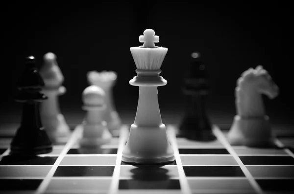 Chess piece on the board background — Stock Photo, Image