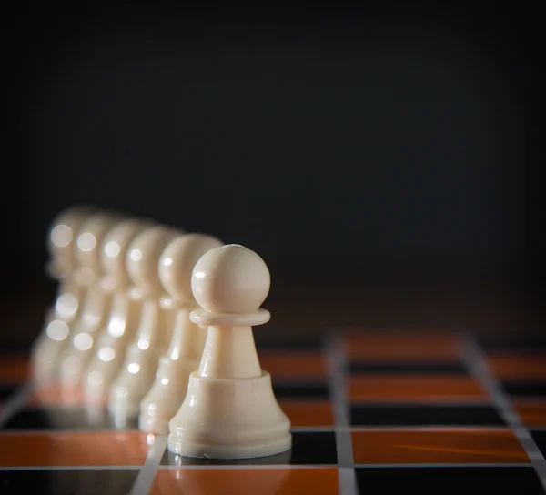 Chess piece on the board background — Stock Photo, Image