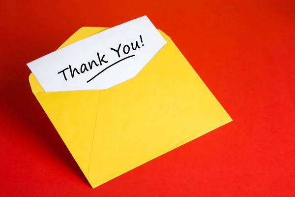 Yellow Envelope Words Thank You Red Background Stock Image