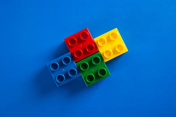 Plastic Building Blocks Blue Background — Stock Photo, Image