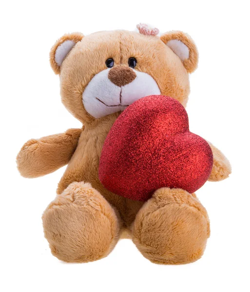 Osito de peluche sosteniendo un corazón —  Fotos de Stock