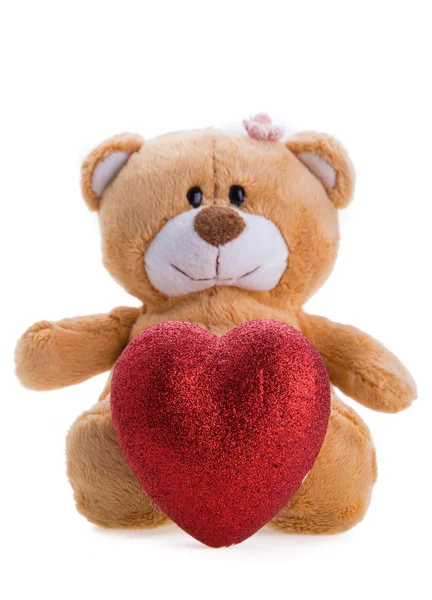 Urso de pelúcia segurando um coração — Fotografia de Stock