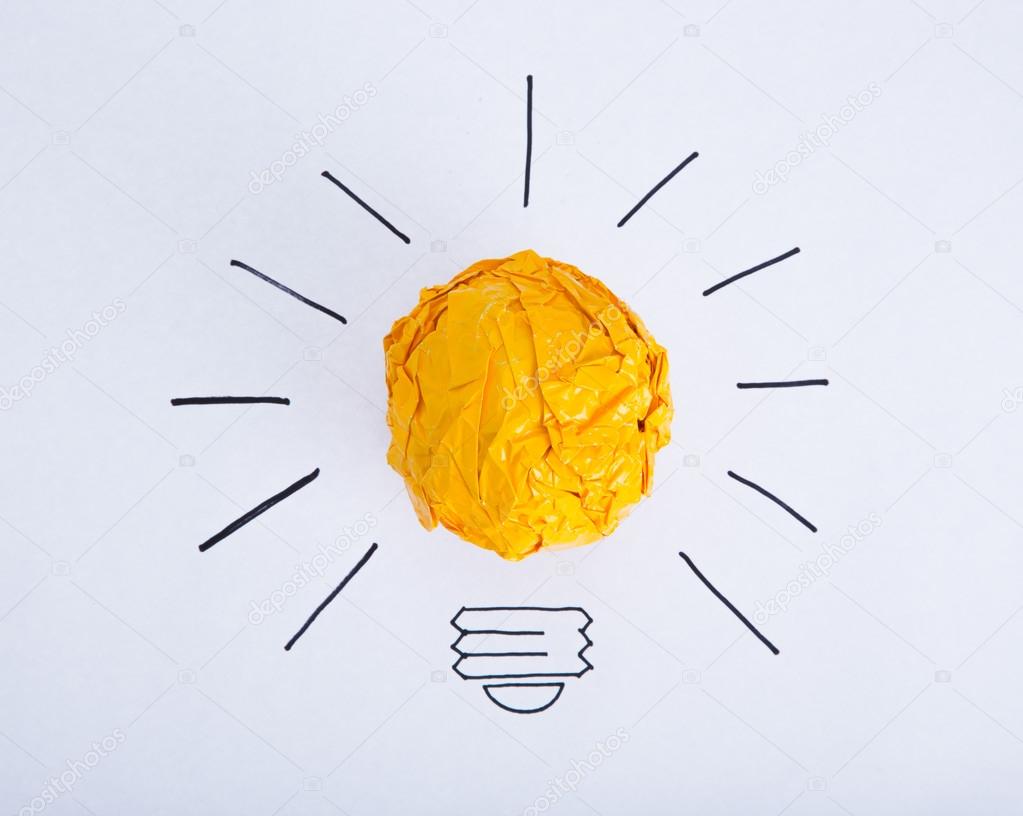 Inspiration concept crumpled color paper light bulb