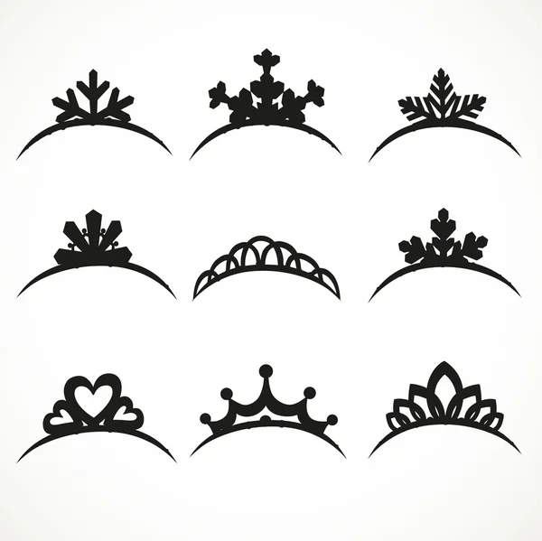 Set of silhouettes of tiaras of various shapes on a white backgr — Stock Vector
