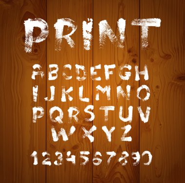 Doku fırçalar ve boya ile yazılmış yazı tipi gerçekçi textur üzerinde