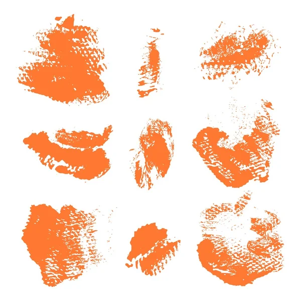 Set of textured dry brush strokes of orange paint on white backg — Stock Vector