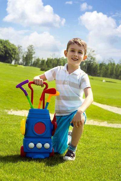 Kleine jongen golfer — Stockfoto
