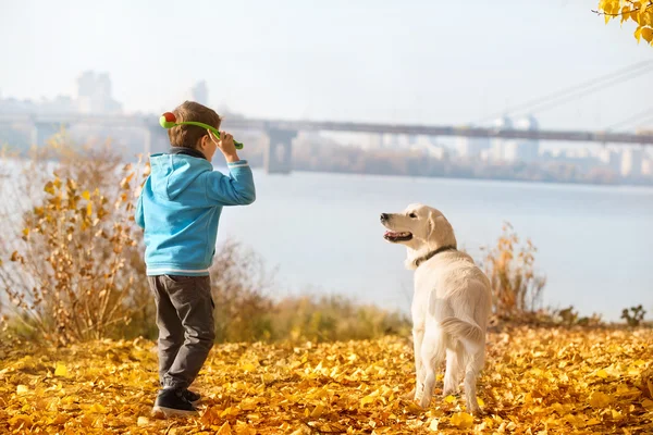 Autumn walk with pet — Stock Photo, Image