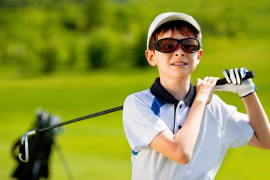Portrait of boy golfer  clipart