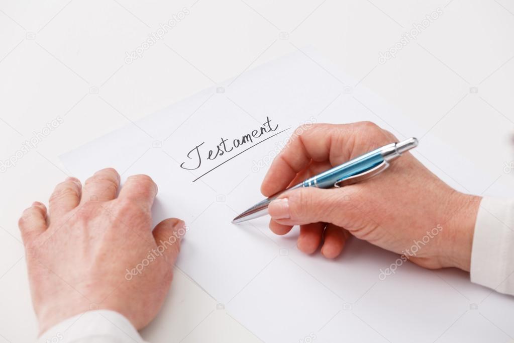 elderly woman writing testament