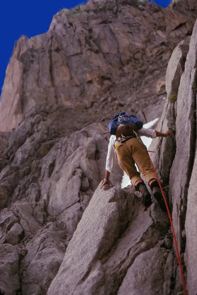 Climber on rocky slope