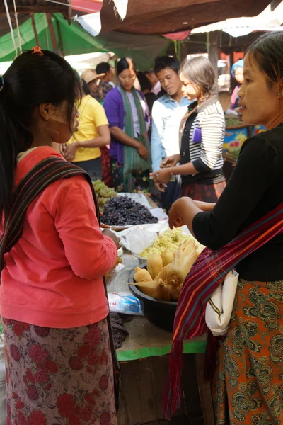 Young woman at the weekly market