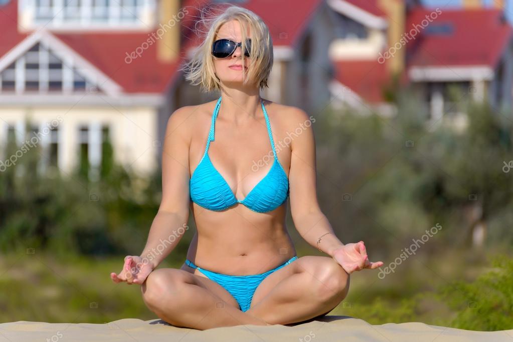 Woman in a blue bikini Stock Photo by ©Yurriy 105653828