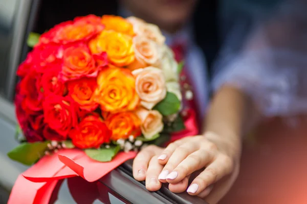 Hands of bride and groom in a shape of heart — Stock Photo, Image