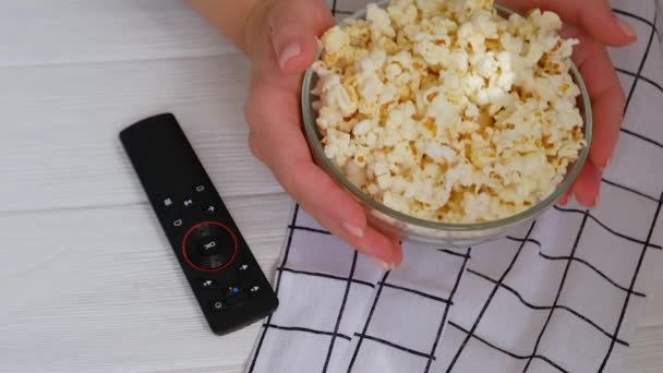 Close Female Hand Taking Popcorn Big Glass Bowl Watching Movie — Stock Video