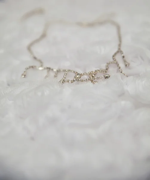 Necklace on a neck at the bride — Stock Photo, Image