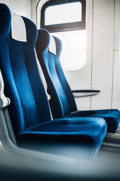Soft seats with high backs in the carriage - comfort and safety on a long-distance train