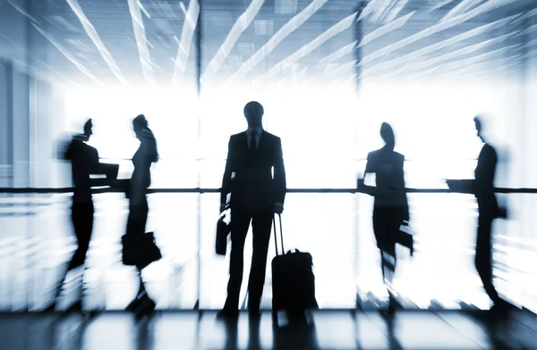 Silhouettes of businesspeople — Stock Photo, Image