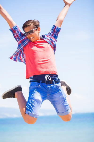 Jumping teen boy — Stock Photo, Image