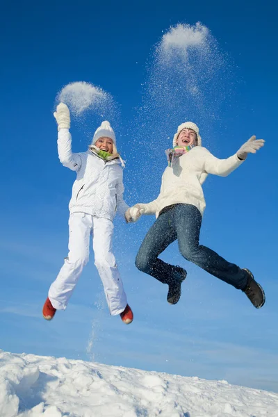 Young Couple Having Fun Jumping Snowy Hill Winter — Stock Photo, Image