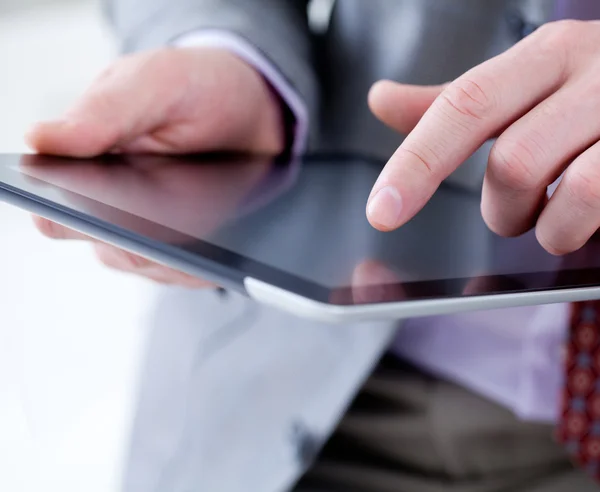 Male hands touching digital tablet — Stock Photo, Image