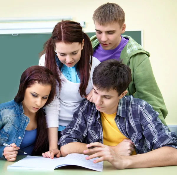 Group of students in classroom Stock Photo