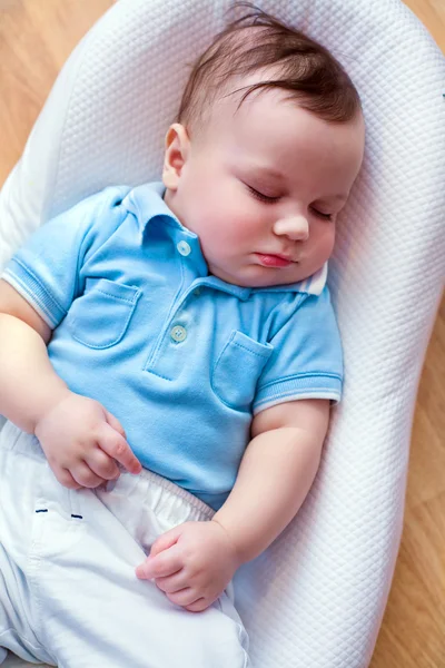 Baby is sleeping in cradle — Stock Photo, Image