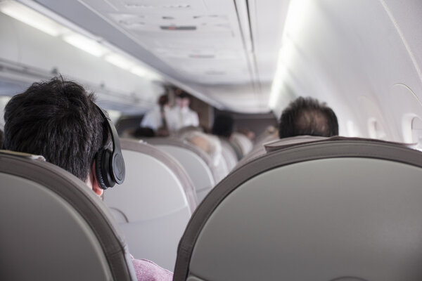 Interior of airplane with passengers 