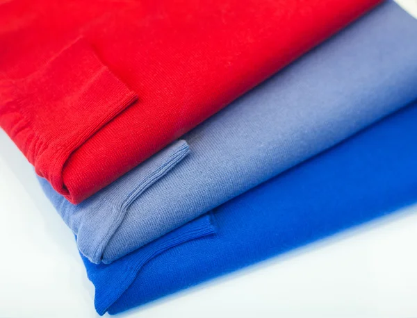 Colorfull sweaterin the clothes shop — Stock Photo, Image