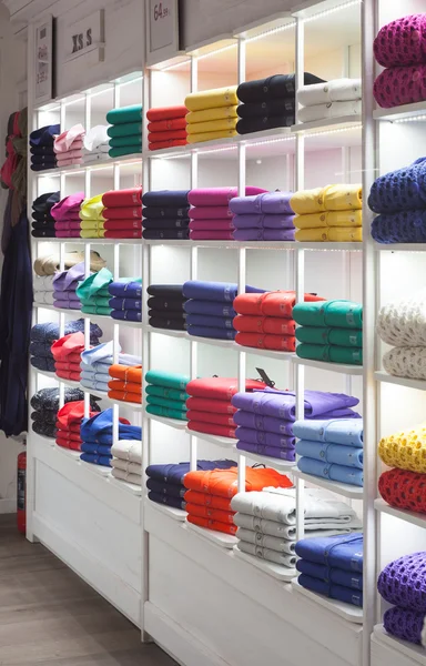 Colorfull sweaterin the clothes shop — Stock Photo, Image