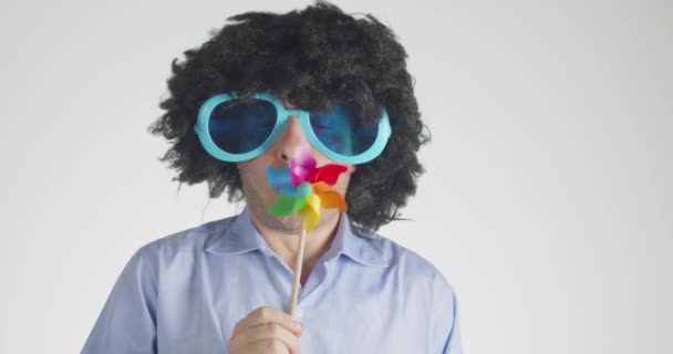 Front View Man Curly Hairy Wearing Funny Big Sunglasses Blows — Stock Video