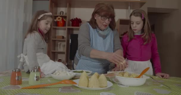 Granddaughters Helps Her Young Grandmother Cook Arancini Typical Sicilian Food — Stock Video