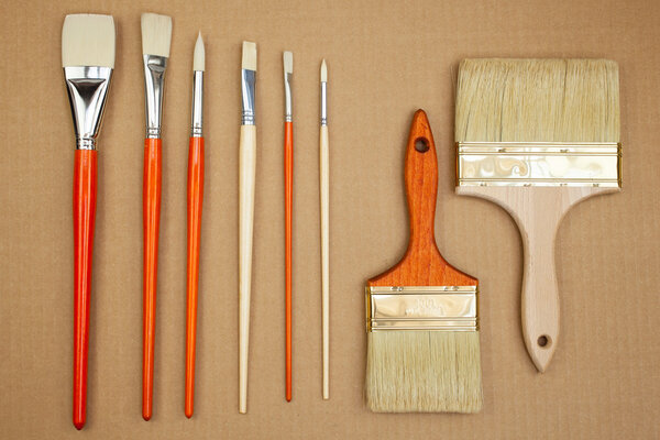 Paintbrushes on cardboard