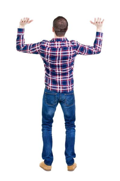 Человек в клетчатой рубашке держать на га — стоковое фото