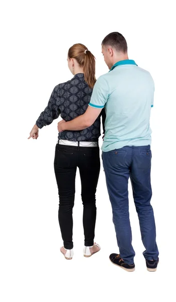 Casal jovem apontando . — Fotografia de Stock