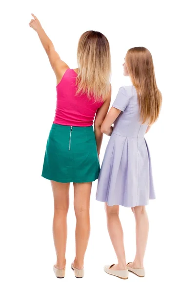 Back view of two pointing young girl. — Stock Photo, Image