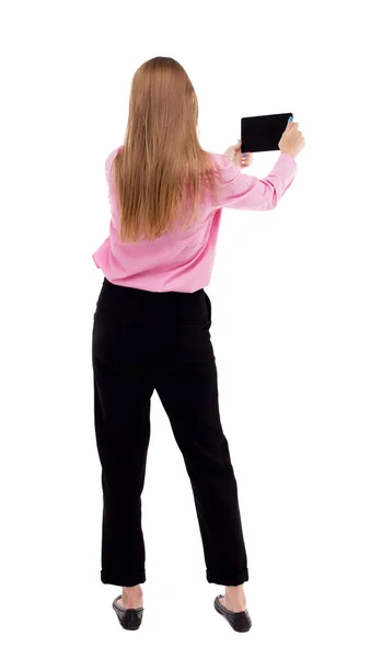 Állandó fiatal gyönyörű lány tabletta számítógép hátulnézete — Stock Fotó