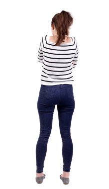 arkadan görünüşü duran genç güzel kadın.