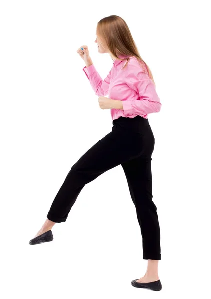 Skinny woman funny fights waving his arms and legs. — Stock Photo, Image