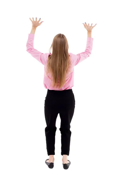 Back view of business woman  protects hands from what is falling — Photo