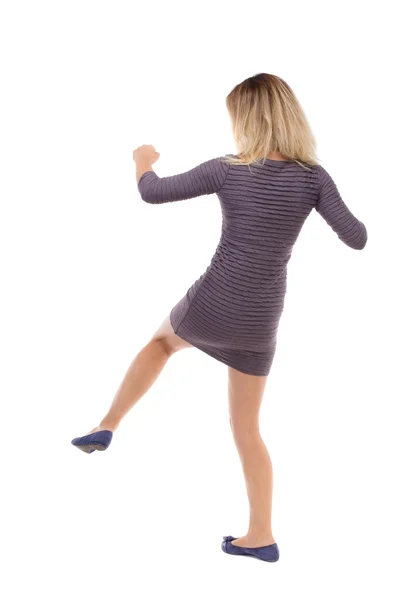 Skinny woman funny fights waving his arms and legs. — Stock Photo, Image