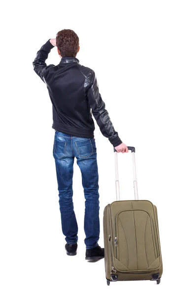 Back view of man with  green suitcase looking up. — Stock Photo, Image