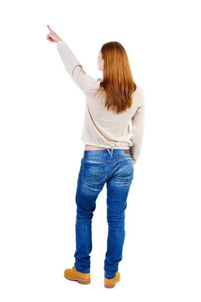 Back view of  pointing woman. beautiful girl. — Stock Photo, Image