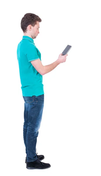 Back view of business man uses mobile phone. – stockfoto