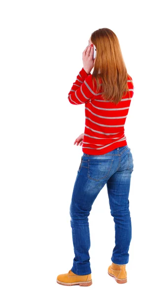 Vista posterior de una mujer hablando por teléfono. — Foto de Stock