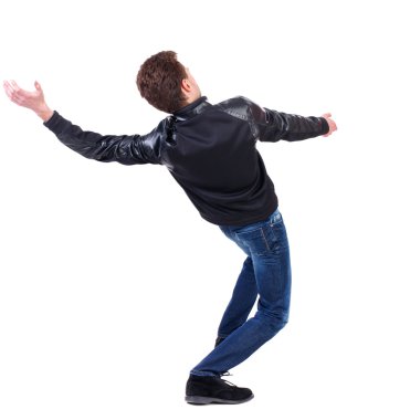 Balancing young man. or dodge the falling .
