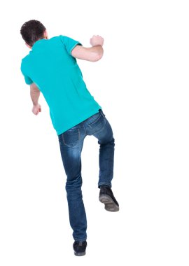 Balancing young man. or dodge the falling .
