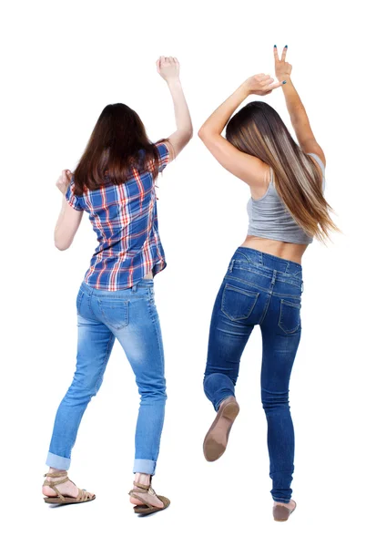 Back view of two dancing young women. — Stok fotoğraf