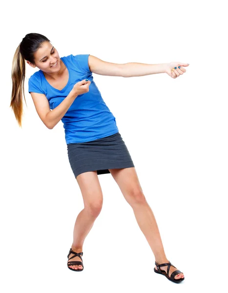Back view of standing girl pulling a rope from the top or cling — Stock Photo, Image