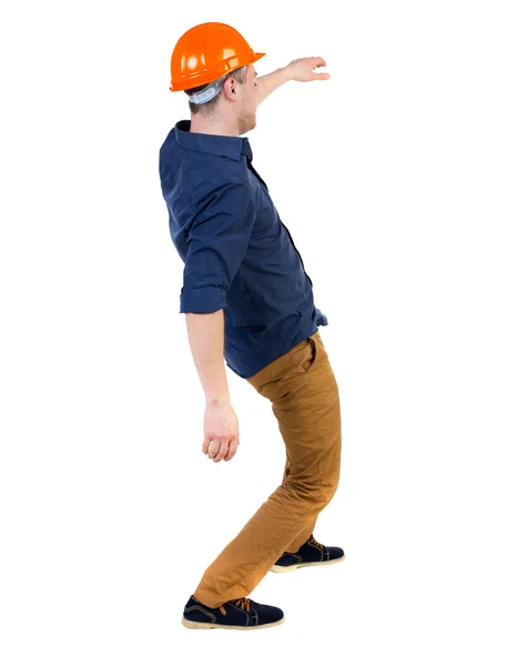 Balancing young man. — Stock Photo, Image